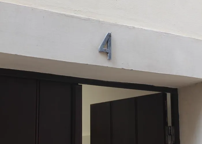 ゲストハウス Entre Linhas コインブラ